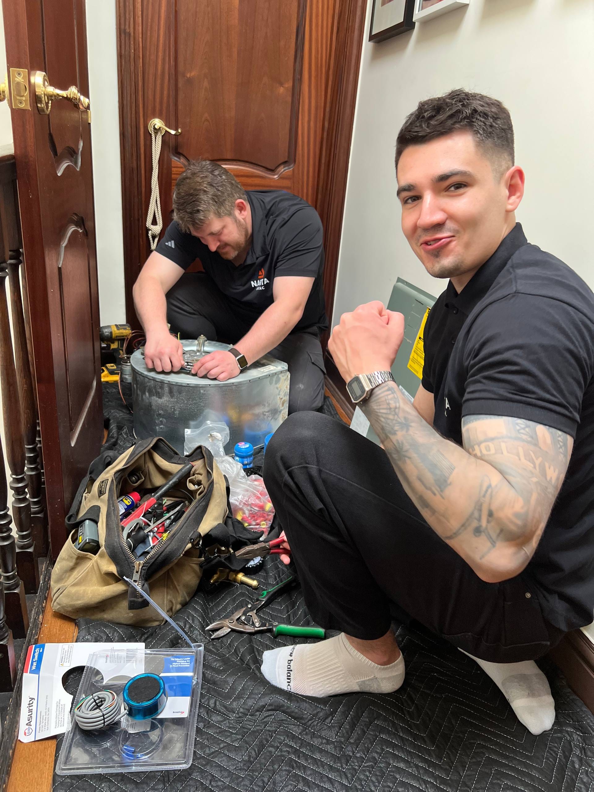 Electrical and HVAC service work completed, including deep air handler cleaning and installation of an automatic safety shutoff system in case of water leaks inside the unit.